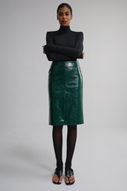 Спідниця міді з лакованої екошкіри