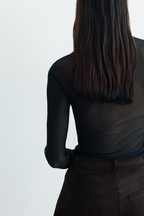 Прозорий лонгслів-сітка з акцентною деталлю