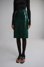 Спідниця міді з лакованої екошкіри